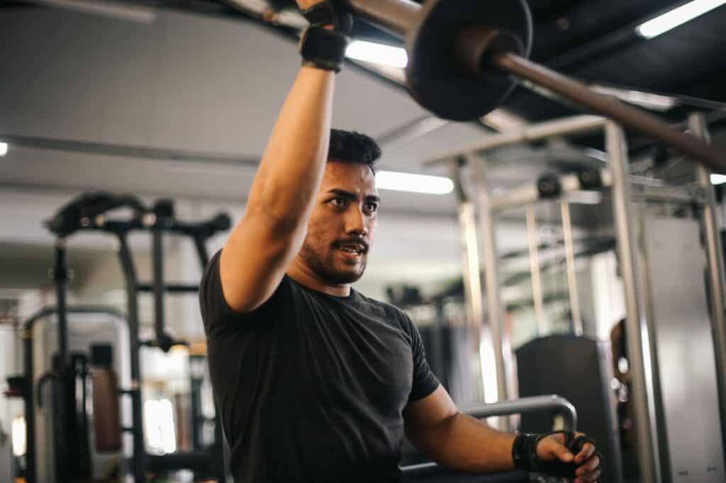 Man Working Out at Gym